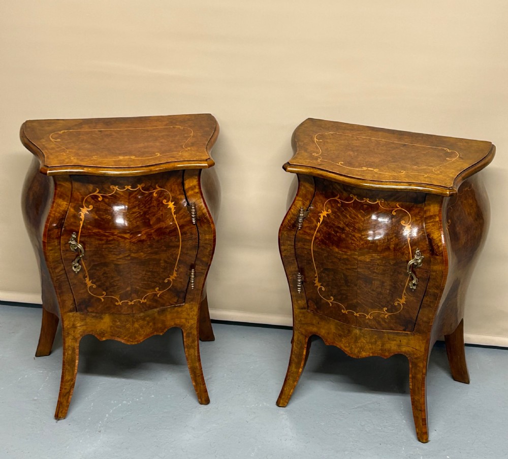 Pair of Walnut french bombe side cabinets 