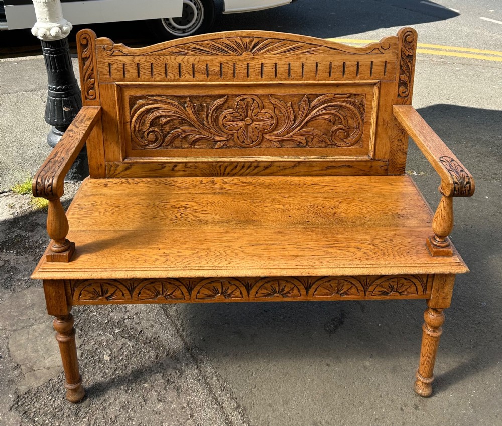 Carved oak hall seat View III