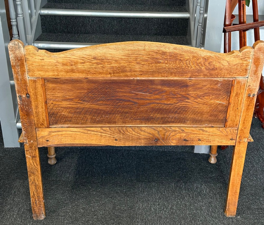 Carved oak hall seat View VIII