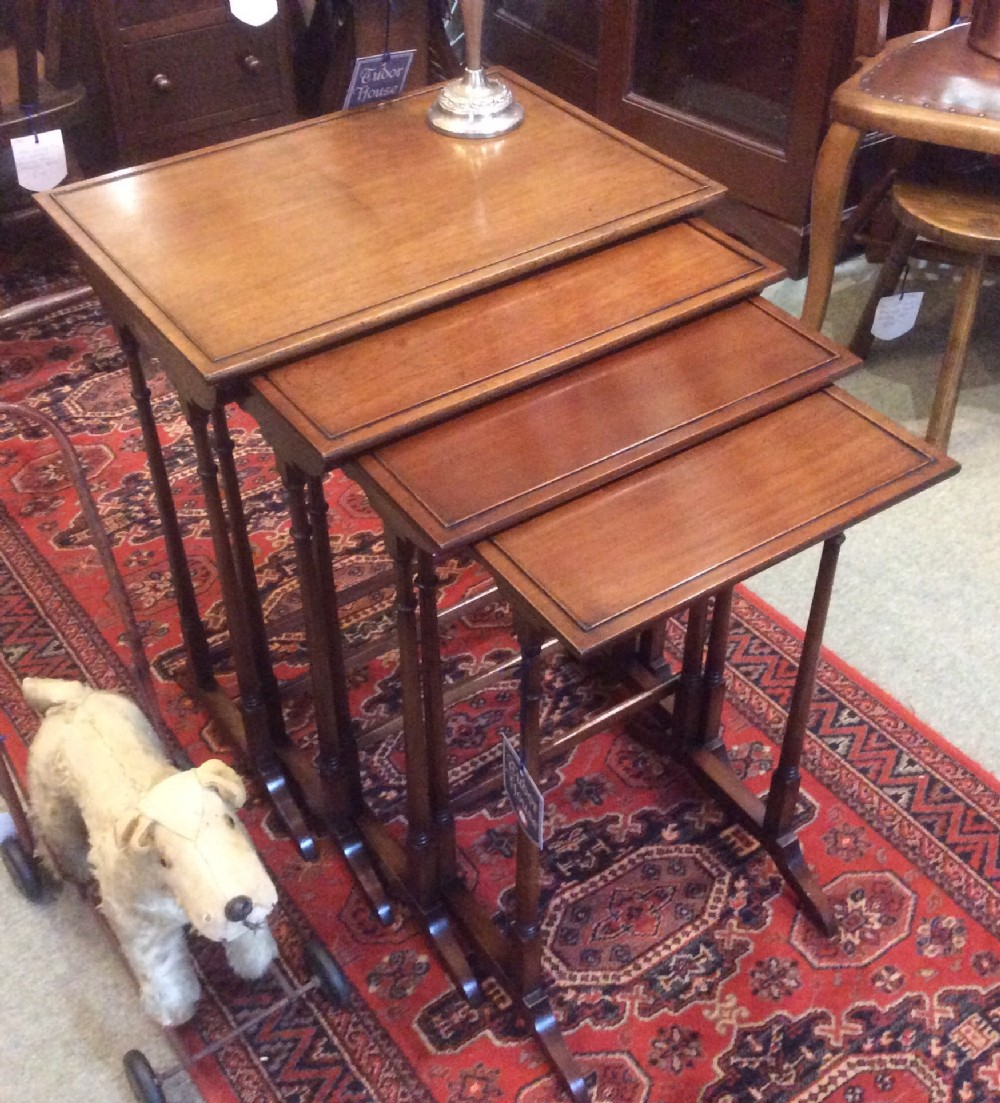 Quartetto set of Mahogany Tables 