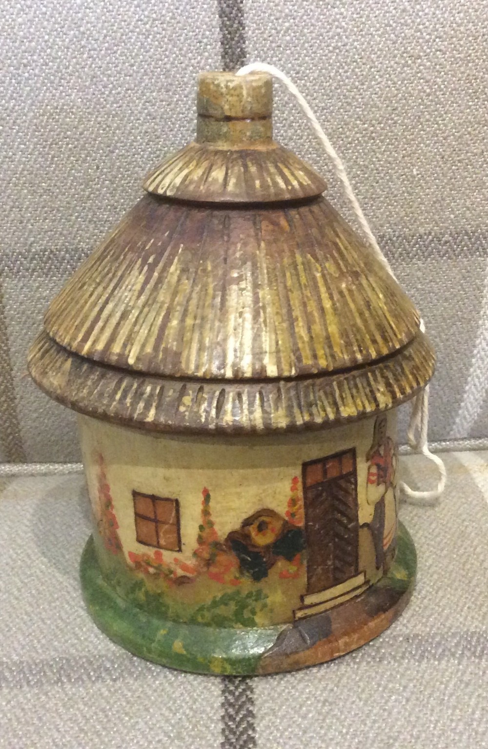 Two Treen storage boxes modelled thatched cottages