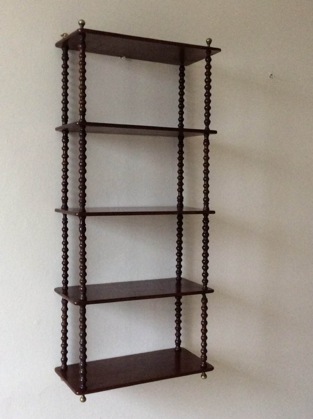 Mahogany wall hanging shelves 