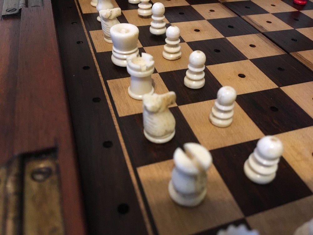 19th Century Mahogany cased travelling chess set  View II