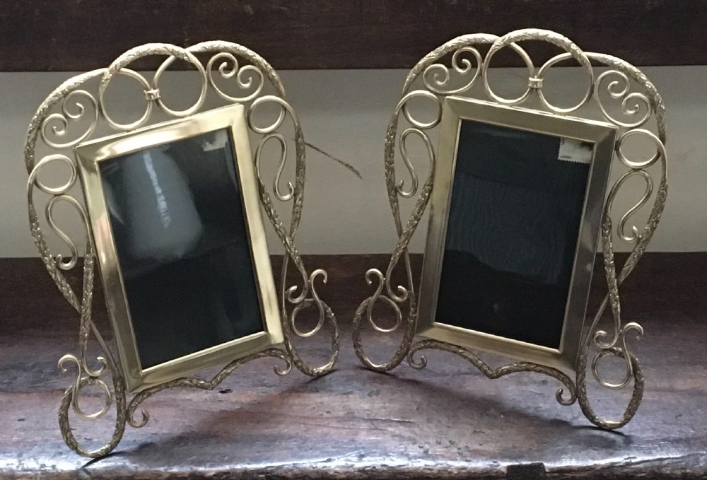 Pair of brass photograph frames 