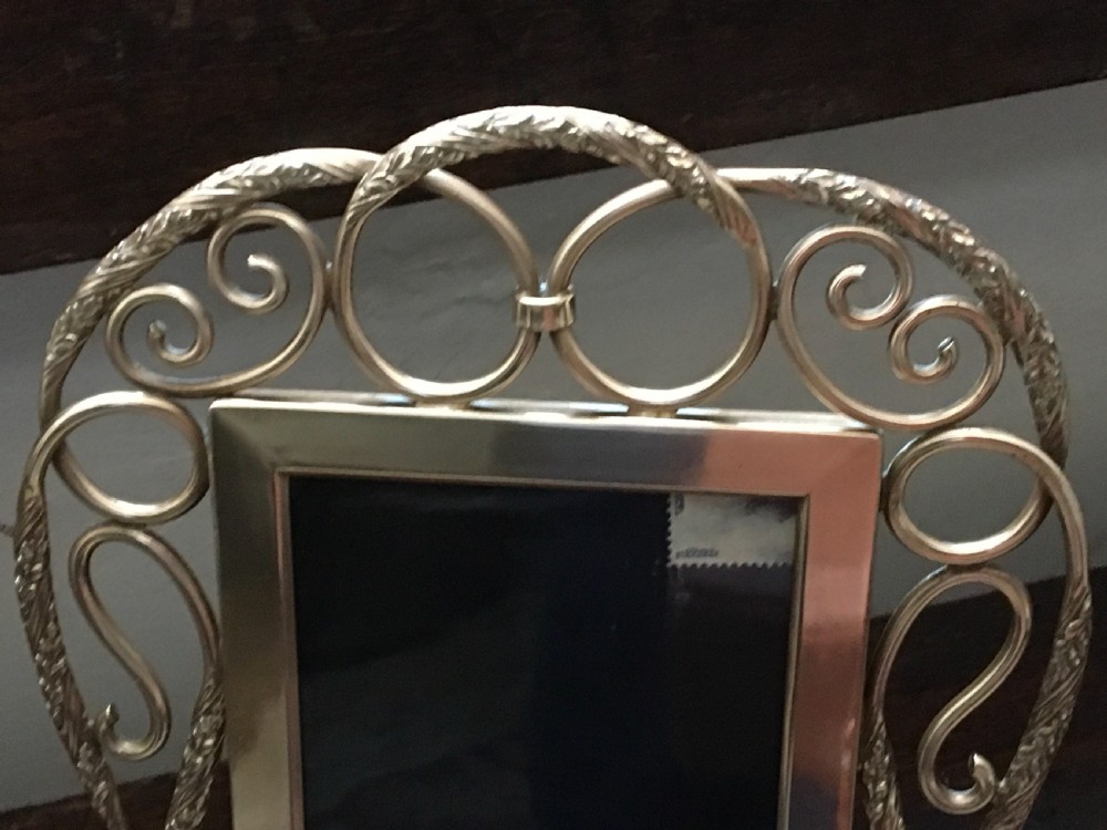 Pair of brass photograph frames  View II