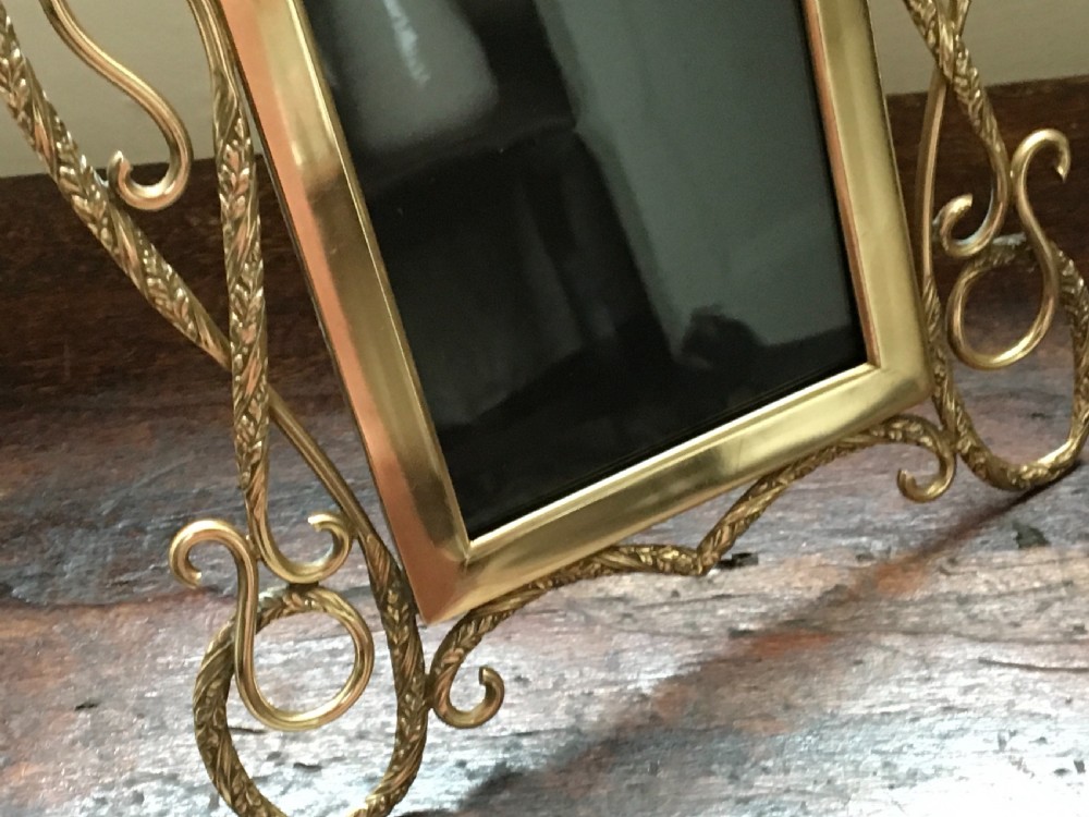 Pair of brass photograph frames  View III