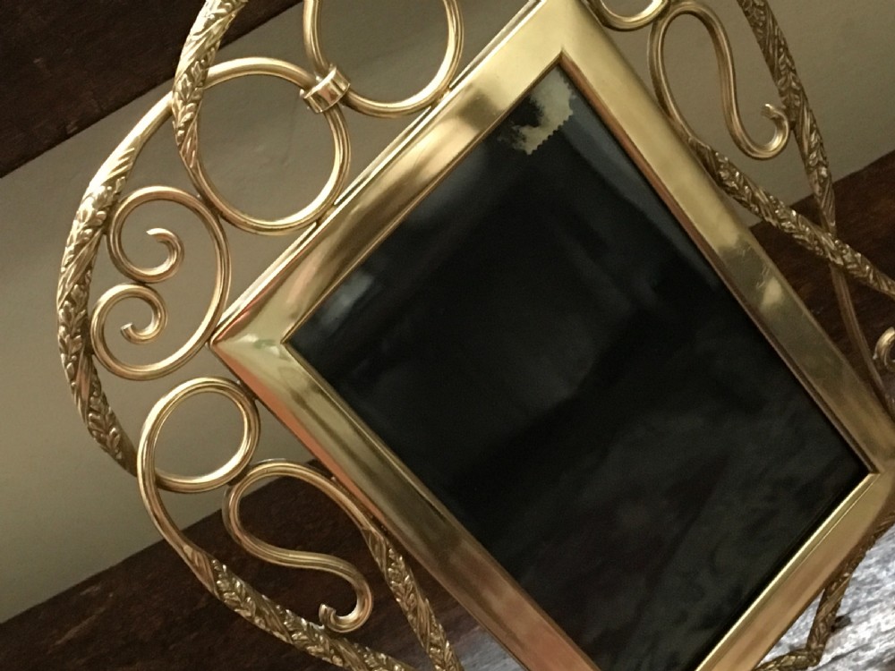 Pair of brass photograph frames  View V
