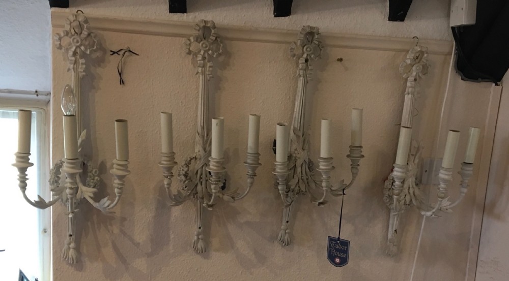 Set of four three branch antique wall lights  View II
