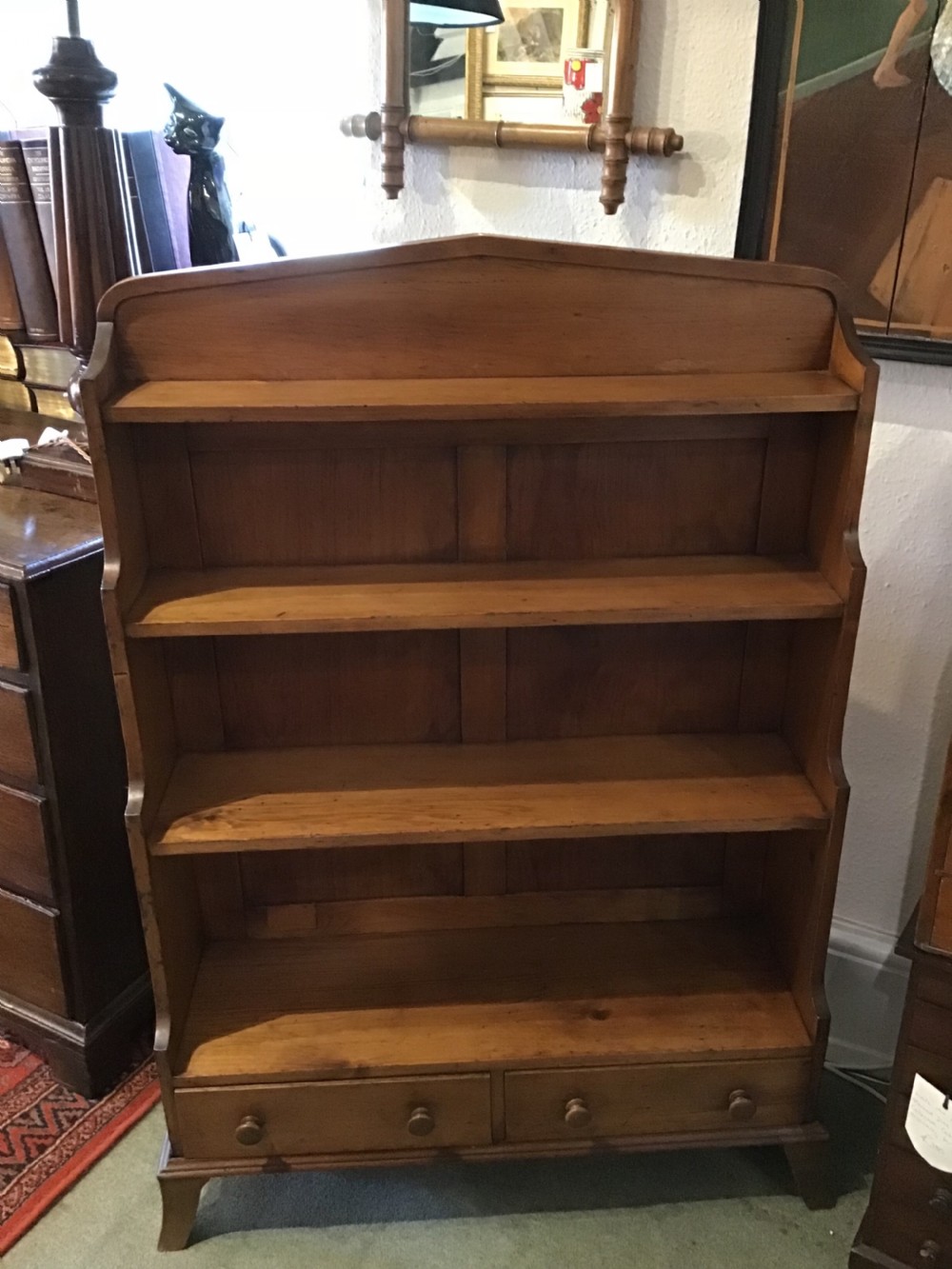 Early Victorian fruitwood waterfall bookcase 