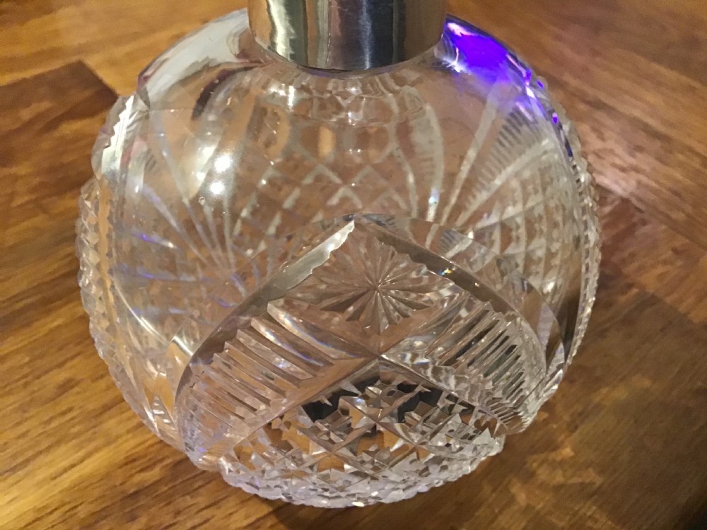 Cut glass silver topped perfume bottle by William Comyns View III