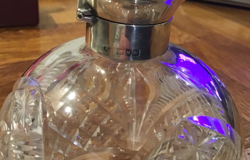 Cut glass silver topped perfume bottle by William Comyns View V