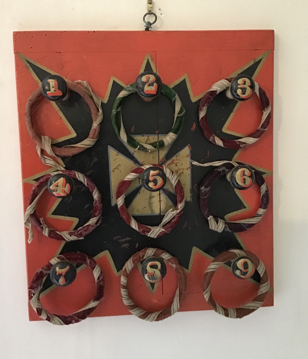 Fairground painted Hoop-La game with nine hoops 
