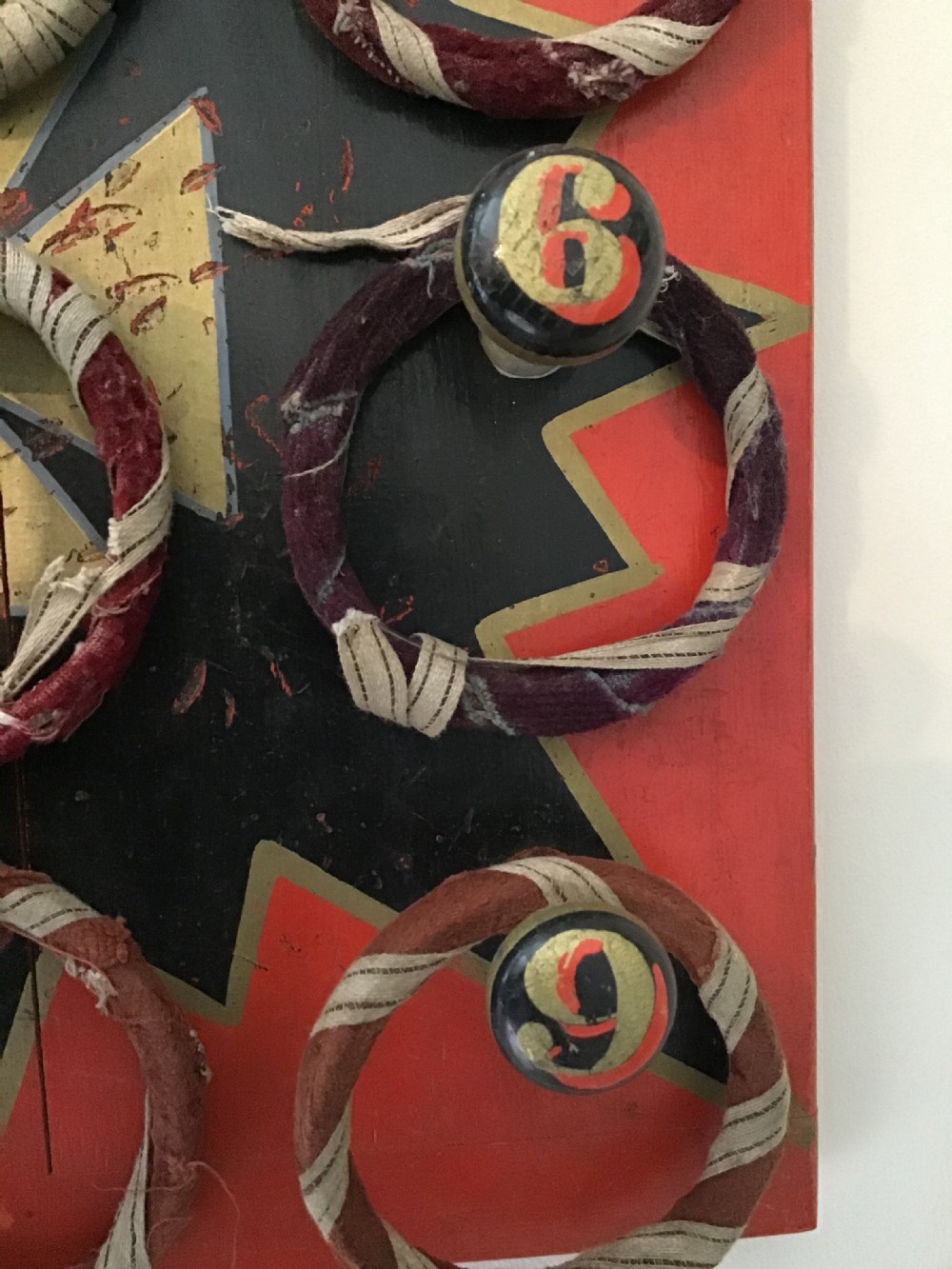 Fairground painted Hoop-La game with nine hoops  View V
