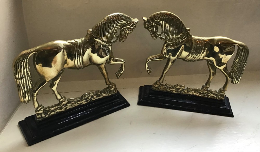 Pair of Victorian brass horse hearth ornaments 