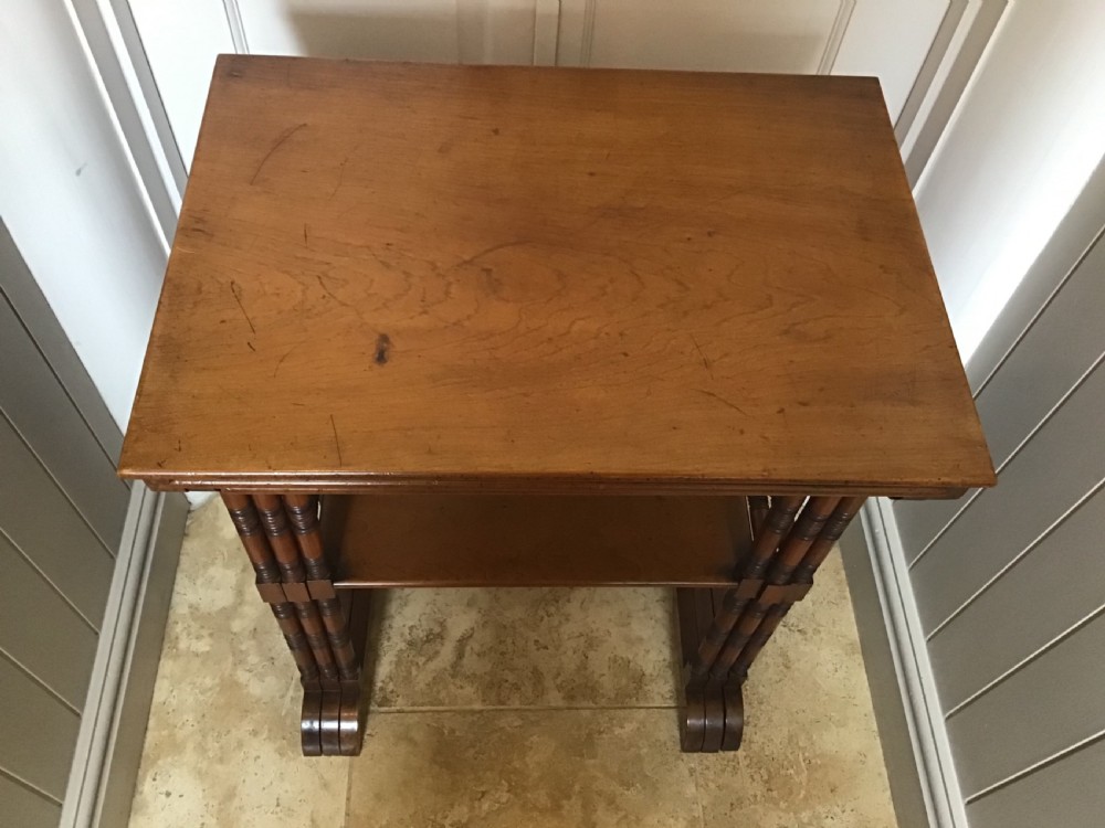 Aesthetic movement nest of three walnut tables  View V