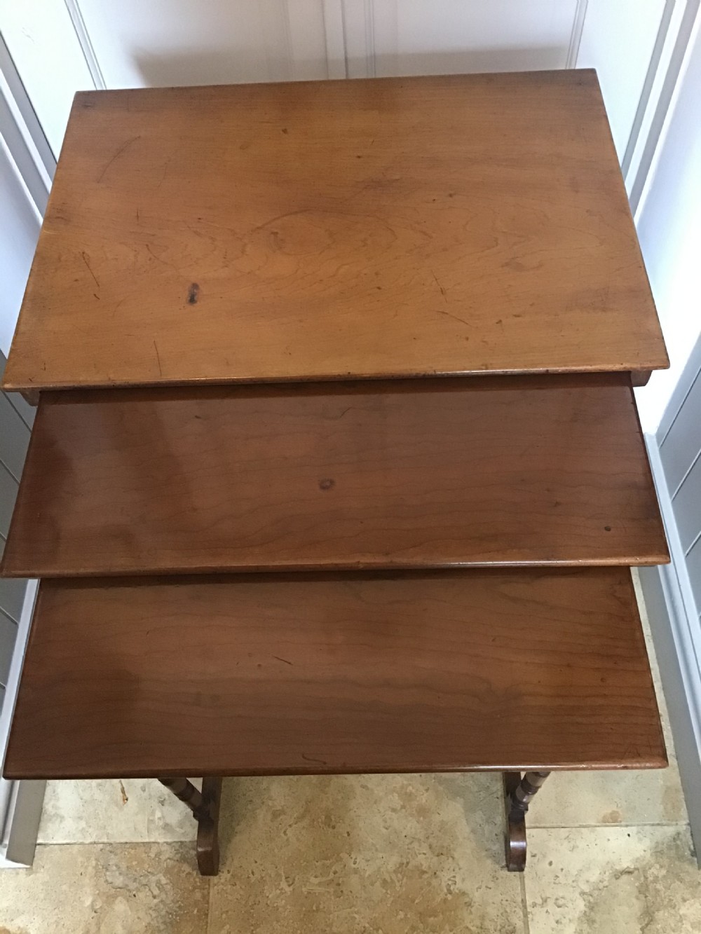 Aesthetic movement nest of three walnut tables  View VI