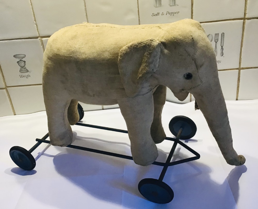 Antique Elephant on wheels pull along toy c1900 