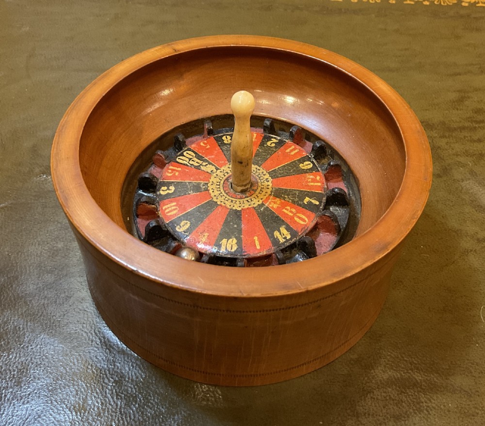 Antique miniature roulette game View III