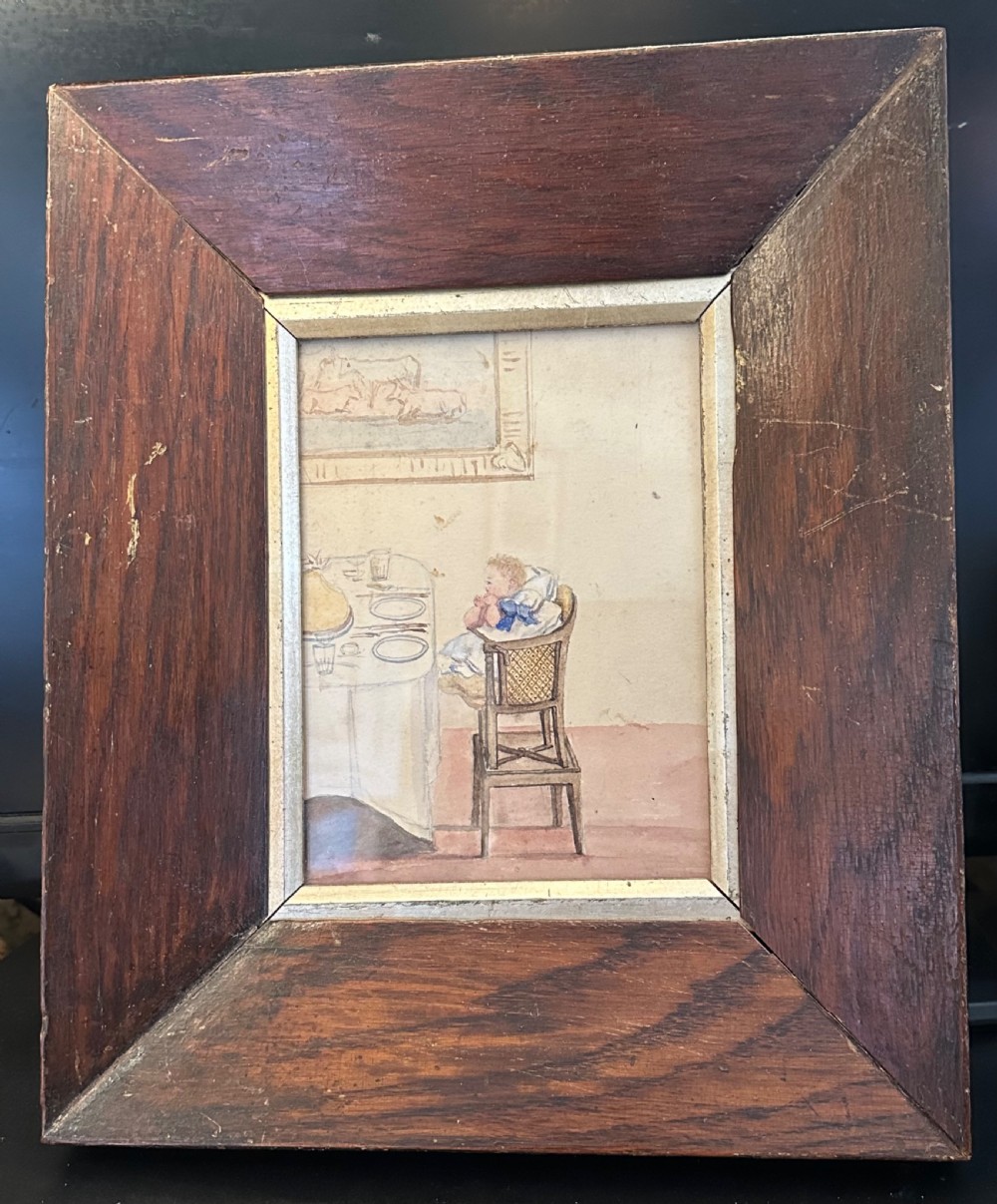 Early 19th century watercolour of a young baby in a high chair 