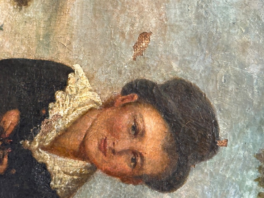 An antique naive oil painting depicting a young boy in dark attire holding a bird nest within a landscape setting, enclosed in a wooden frame. View IV