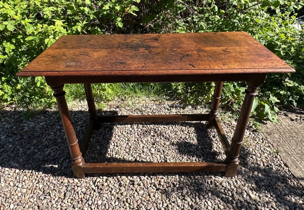 Early 18th century small oak refectory table 