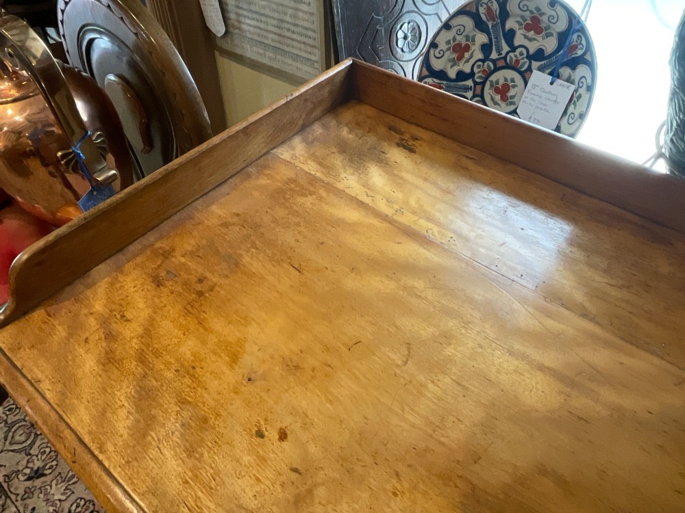 A Victorian satin birch writing desk featuring a three-quarter gallery top, two frieze drawers with turned wooden knobs, and four turned legs. View IV
