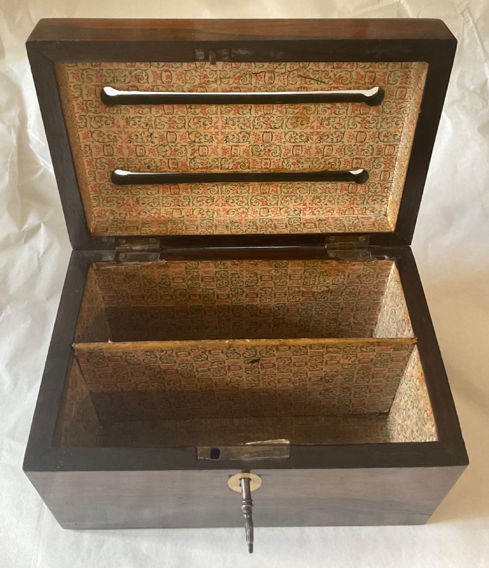 A dark mahogany 19th-century letter box featuring two top slots labelled Answered and Unanswered, a turned central knob, and a front keyhole with an inserted key. View VI