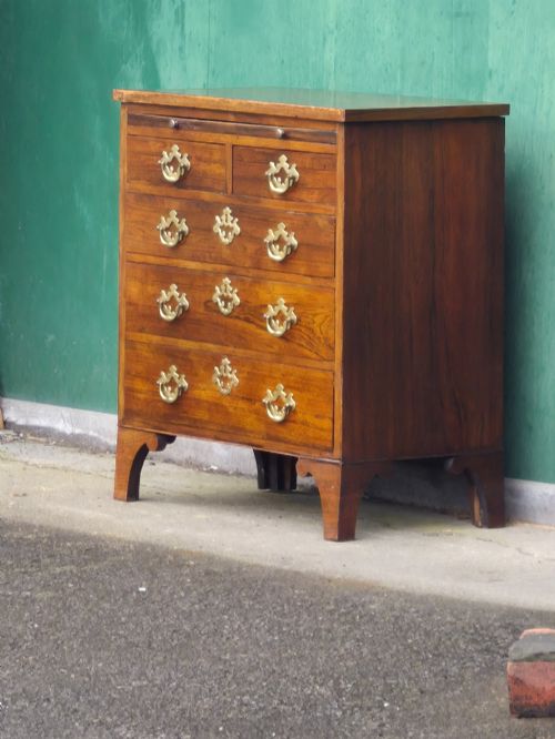 SMALL ROSEWOOD CHEST OF DRAWERS