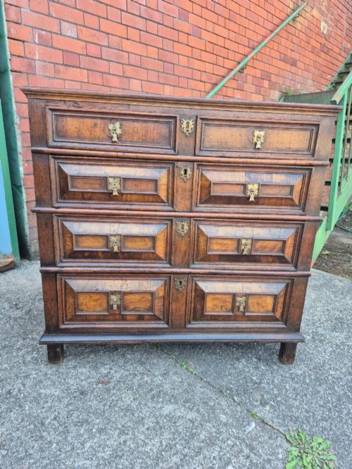 CHARLES II OAK AND WALNUT GEOMETERIC CHEST OF DRAWERS