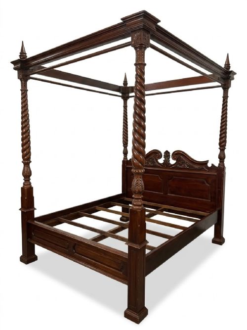 A dark mahogany four-poster bed frame featuring four spiral barley-twist posts topped with finials, a carved headboard, and claw-and-ball feet. View VI