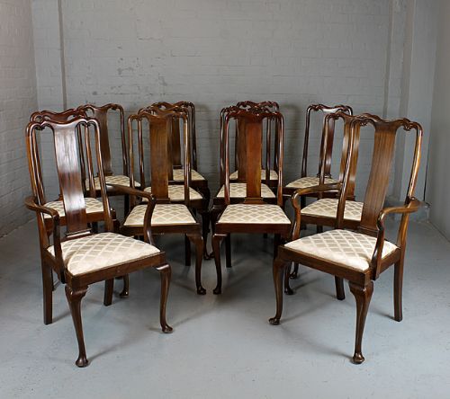 Set of 12 Walnut Dining Chairs.