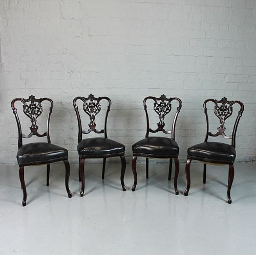 Set of Four Leather Seat Dining Chairs.