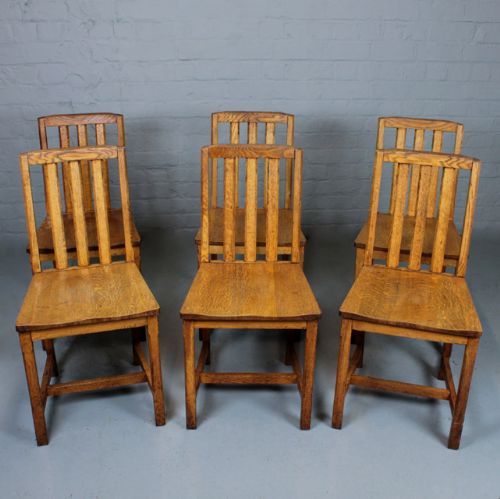 Six Heal's Oak Dining Chairs.