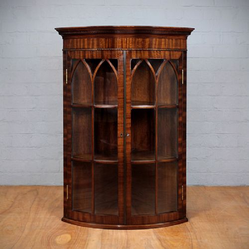 Bow Front Corner Display Cabinet.