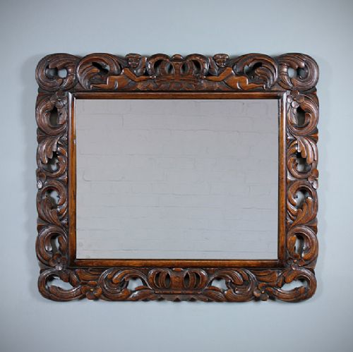 Carved Oak Framed Mirror.