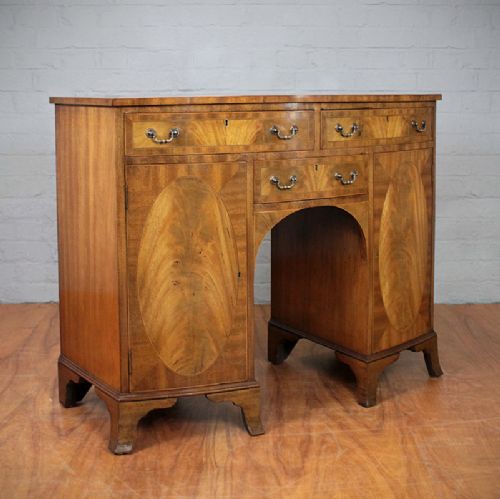 Bow Front Mahogany Kneehole Desk.
