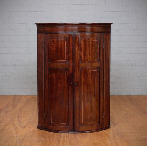 Early 19th.c. Bow Front Cupboard.
