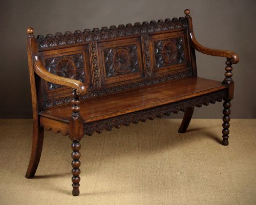Carved Oak Settle C.1880.