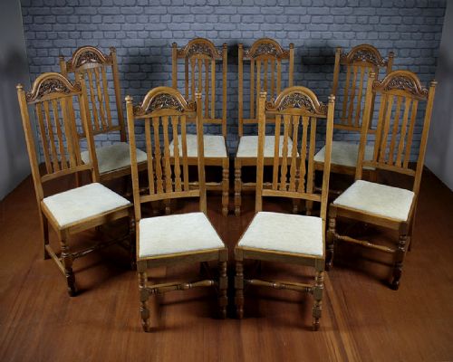 Set of Eight Pale Oak Dining Chairs C.1910.