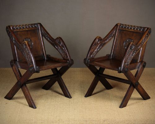 Pair of Carved Oak Glastonbury Chairs C.1890.