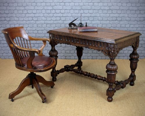 19th.c. Carved Oak Writing Table C.1890.