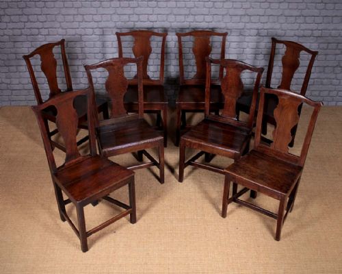 Eight Georgian Oak Dining Chairs C.1810.