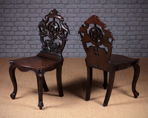 Pair Oak Hall Chairs with Peacock’s Head Carvings C.1860.