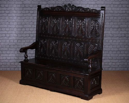 High Back Carved Oak Box Settle. C.1890.