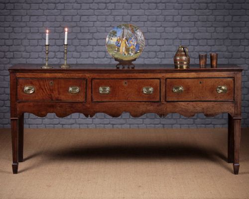 Late Georgian Oak Three Drawer Open Welsh Dresser Base C.1810.