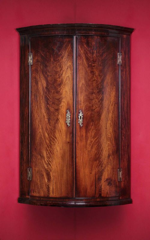 Bow Front Mahogany Corner Cupboard C.1810.