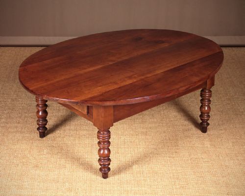 Reduced 19th.c. French Cherrywood Coffee Table.