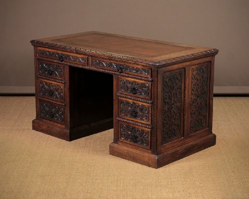Carved Oak & Walnut Kneehole Desk C.1870.