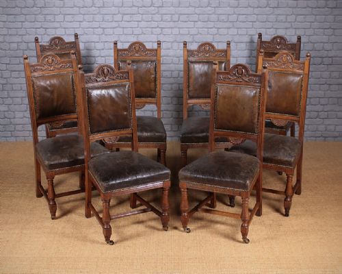 Set of Eight Oak & Leather Dining Chairs C.1890.