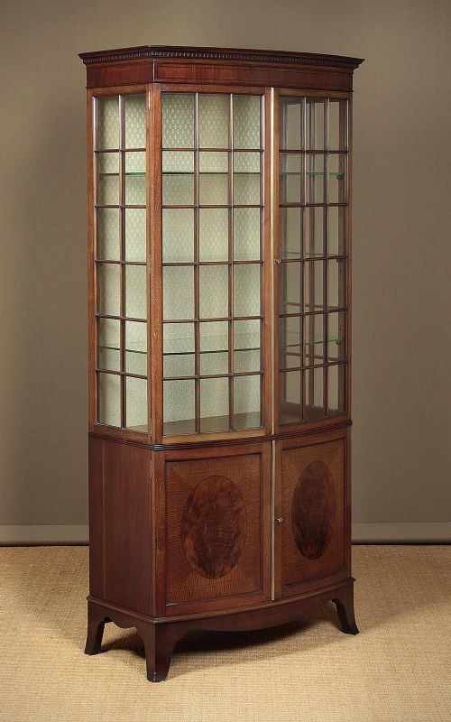 Narrow Bow Front Mahogany Display Cabinet C.1910.